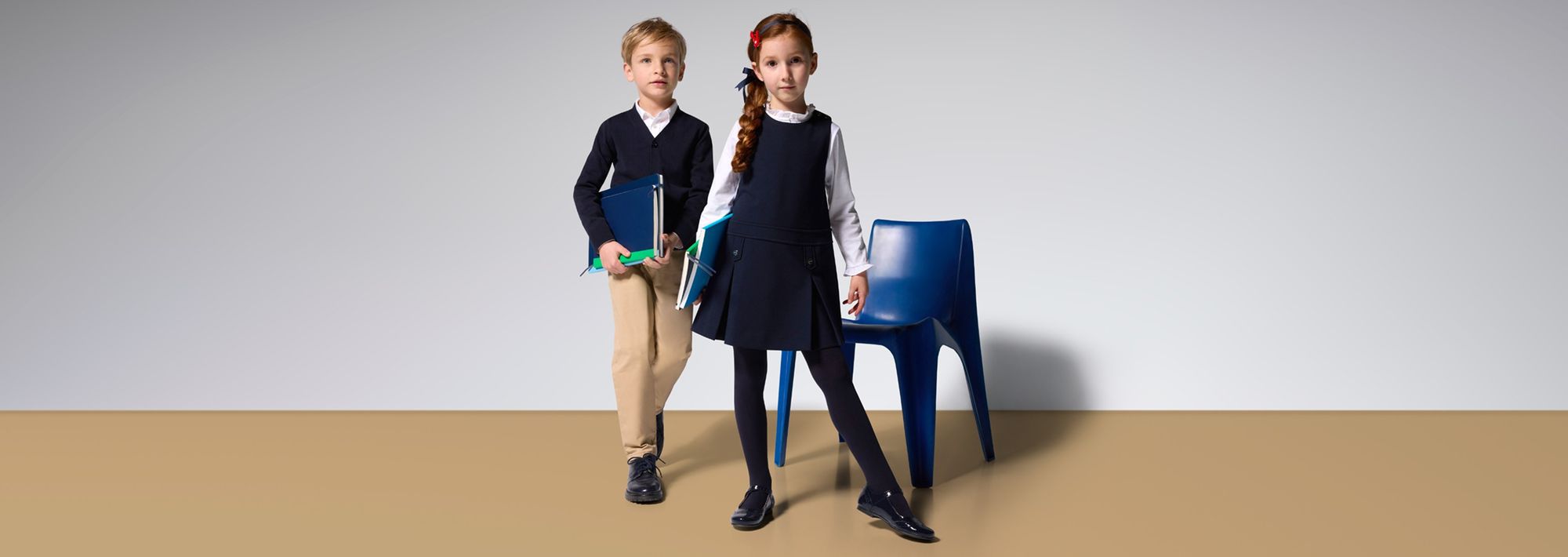 Girl and boy school uniforms